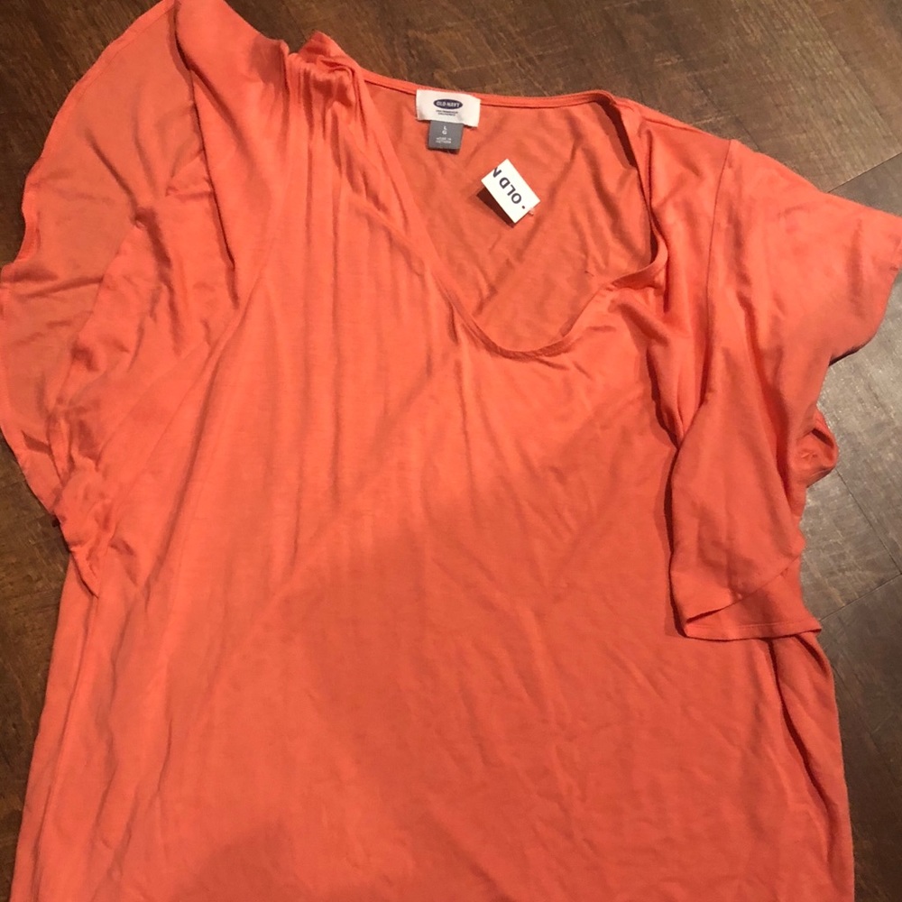 Loose fitting top with “Flowy” sleeves